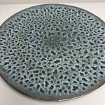 Moroccan handmade stoneware plate in green with leopard spot pattern