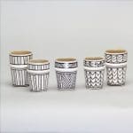 White beldi mugs with different patterns in black
