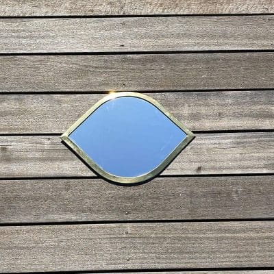 Miroir marocain en forme de paupière fait main avec bord doré