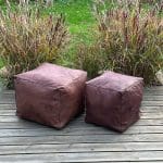 Dark brown leather Moroccan poufs