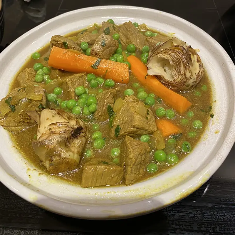 Tagine med ærter og artiskokker