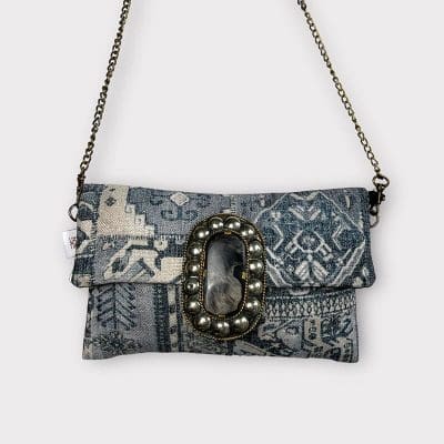 Handbag in shades of gray with copper chain and large decorative button