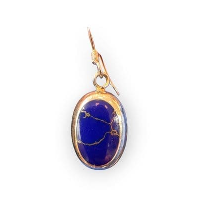 ØRERINGE CELESTIA med stor smuk mørk lilla sten