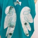 Shirt ANGEL TIDE_ turquoise blue shirt with sewn-on angel wings on the back