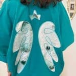 Shirt ANGEL TIDE_ turquoise blue shirt with sewn-on angel wings on the back
