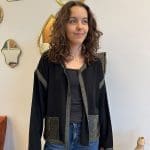Cardigan/jacket_NOÍR SAUVAGE_in soft black fabric with green trim and snakeskin pockets