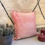 red motif 2. Cactus silk pillowcase with light green patterns.